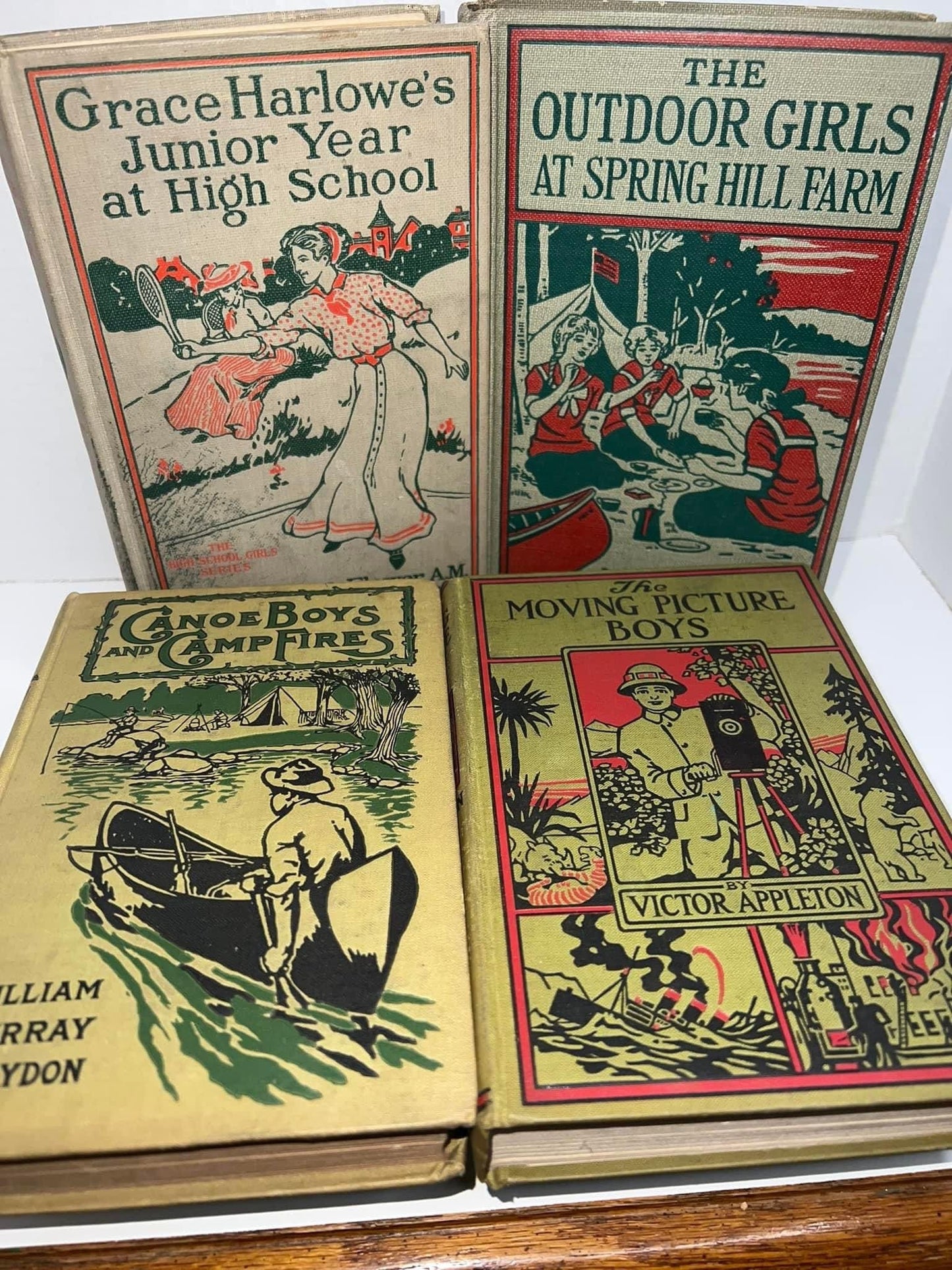 Antique 4 decorated cover young reader books 1912-1920s Outdoor girls , moving picture boys , canoe boys , junior year at high school