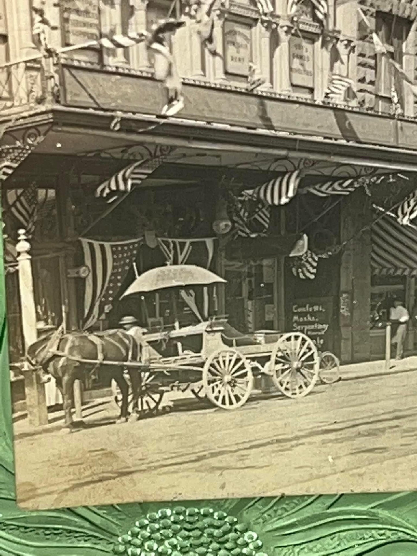 Antique real photo postcard rppc early town celebration tons of American flags mask & confetti store 1908