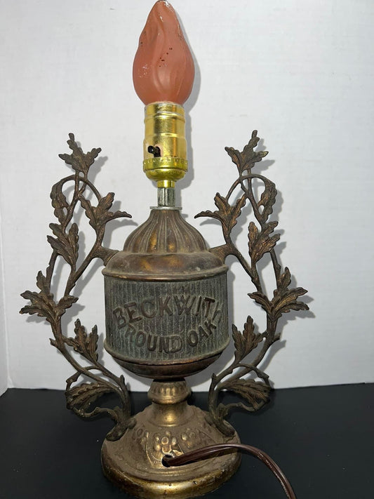 Antique Early stove advertising C 1900s Ornate Finale turned into lamp from — beckwith round oak stoves