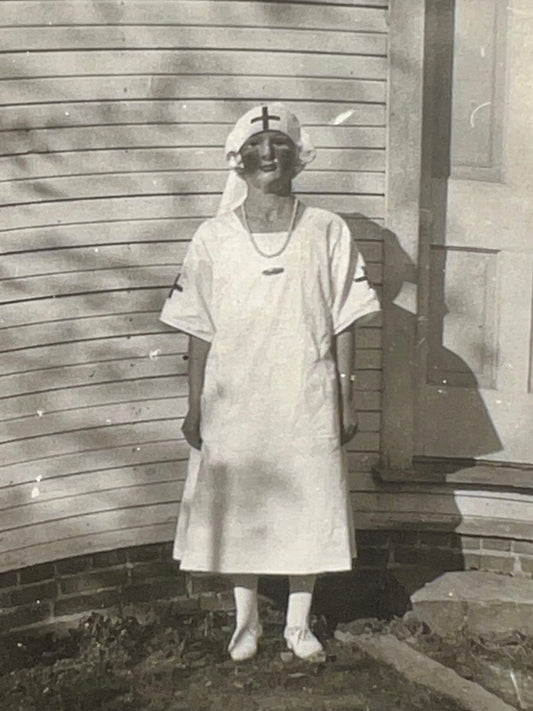 Vintage snapshot photo odd unusual nurse outfit w gauze mask Halloween costume 1930s